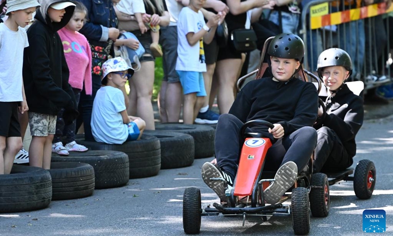 People participate in a Soapbox Race in Narva, Estonia, on June 7, 2026. (Photo by Sergei Stepanov/Xinhua)