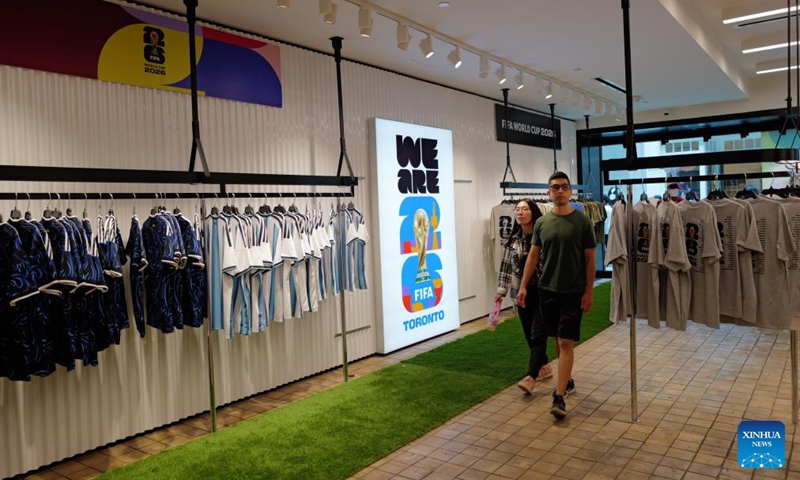 Customers shop at an official FIFA World Cup 2026 store in Toronto, Canada, on June 7, 2026. (Photo by Yang Shu/Xinhua)