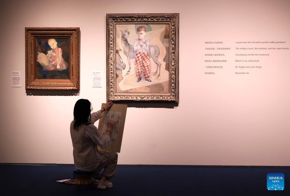 A woman visits an art exhibition titled The Brazil of Portinari at the National Museum of China in Beijing, capital of China, June 9, 2026. The exhibition showcased 56 paintings of the renowned Brazilian artist Candido Portinari. (Photo: Xinhua)