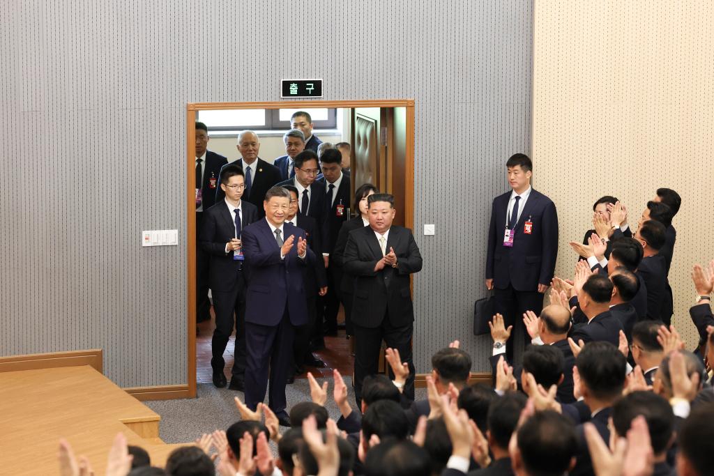 Xi Jinping, general secretary of the Communist Party of China Central Committee and Chinese president, walks into a lecture hall of the Central Cadres Training School of the Workers' Party of Korea (WPK) in the company of Kim Jong Un, general secretary of the WPK and president of the State Affairs of the Democratic People's Republic of Korea (DPRK), in Pyongyang, the DPRK, June 9, 2026. On Tuesday morning, Xi, accompanied by Kim, visited the Central Cadres Training School of the WPK in Pyongyang. (Photo: Xinhua)
