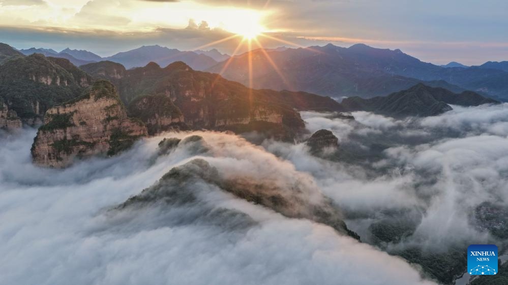 An aerial drone photo taken on June 9, 2026 shows the scenery of a sea of clouds at Xinglong Mountain scenic spot in Chengde City, north China's Hebei Province. (Photo: Xinhua)