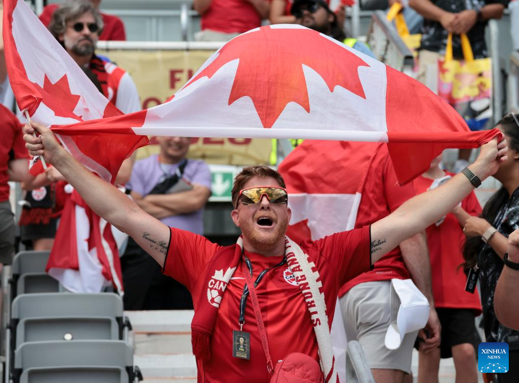 A fan of Canada cheers before the group B match between Canada and Bosnia and Herzegovina at the 2026 FIFA World Cup at Toronto Stadium in Toronto, Canada, June 12, 2026. (Photo by Zou Zheng/Xinhua)