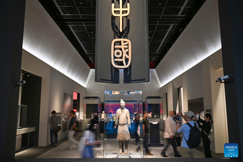 People attend a press preview of the exhibition Dawn of The First Empire: The Qin's Unification in Archaeological Treasures at the Shanghai Museum in Shanghai, east China, June 9, 2026. The exhibition will be open to the public from June 10 to Sept. 7, displaying 328 sets (510 pieces) of cultural relics from 14 archaeological and cultural heritage institutions from northwest China's Gansu and Shaanxi provinces and Shanghai. (Photo: Xinhua)