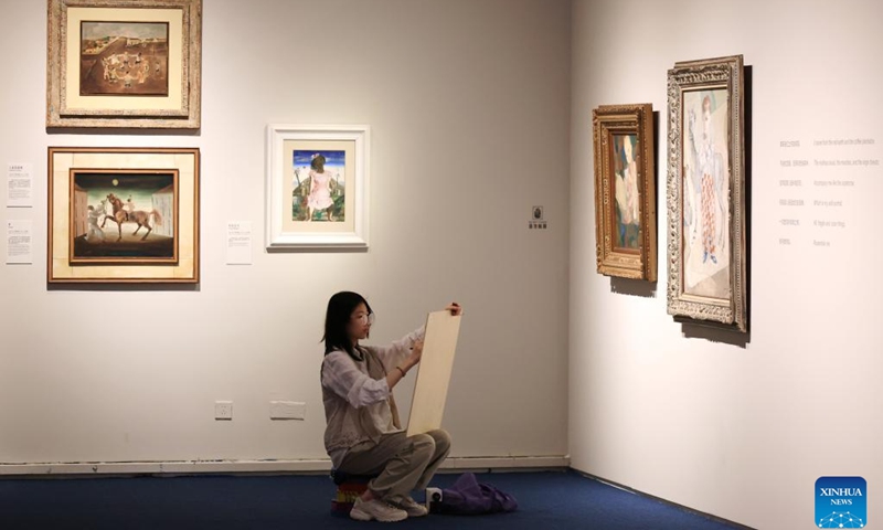A woman visits an art exhibition titled The Brazil of Portinari at the National Museum of China in Beijing, capital of China, June 9, 2026. The exhibition showcased 56 paintings of the renowned Brazilian artist Candido Portinari. (Photo: Xinhua)