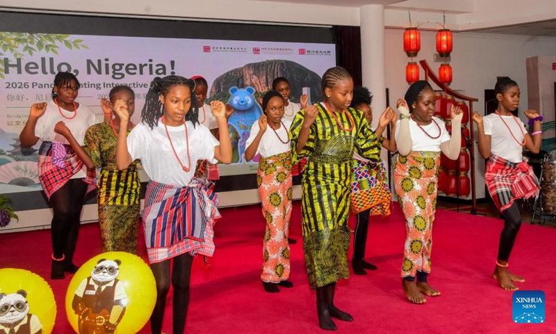 Students dance during the opening event of the Hello Nigeria 2026 Panda Painting Interactive Experience Exhibition at the China Cultural Center in Abuja, Nigeria, on June 8, 2026. More than 200 students and teachers from six local international schools participated in the opening event on Monday. (Photo: Xinhua)