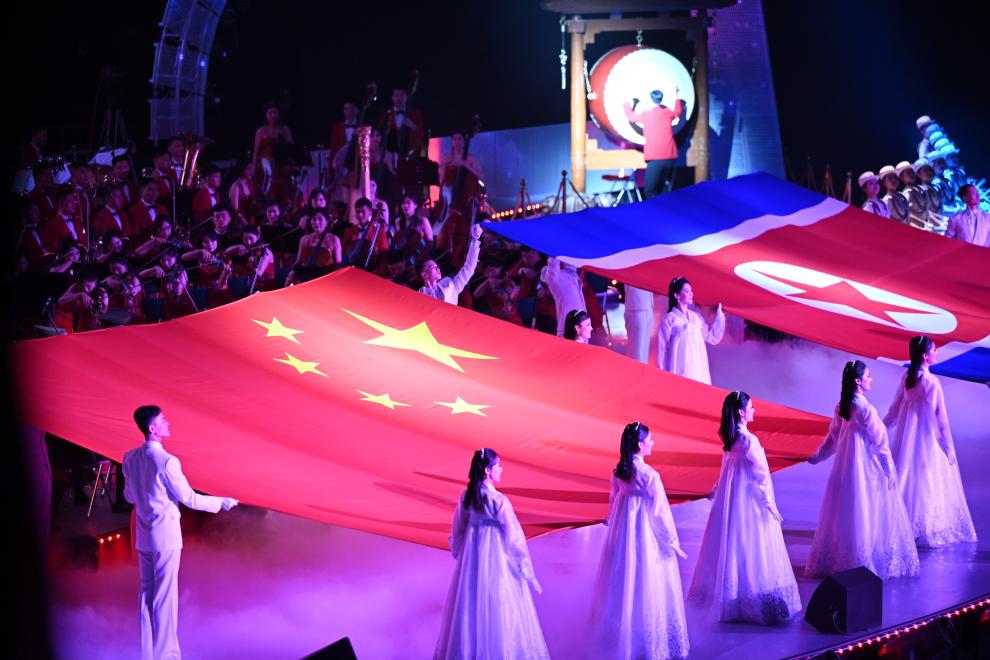 Artists perform during an artistic performance at the Pyongyang Gymnasium in Pyongyang, the Democratic People's Republic of Korea (DPRK), June 8, 2026. Xi Jinping, general secretary of the Communist Party of China Central Committee and Chinese president, and his wife Peng Liyuan, along with Kim Jong Un, general secretary of the Workers' Party of Korea and president of the State Affairs of the DPRK, and Kim's wife Ri Sol Ju, watched the performance on Monday evening. (Photo: Xinhua)