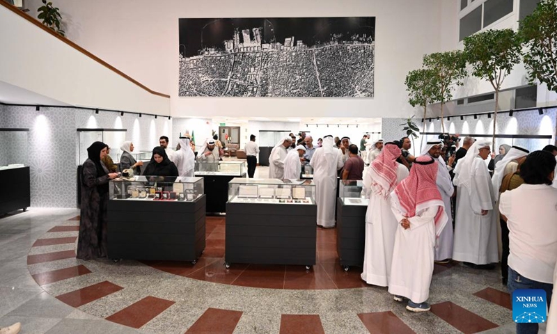 People visit the third International Paper and Metal Coin Exhibition at the Kuwait National Museum in Kuwait City, Kuwait, June 8, 2026. (Photo: Xinhua)