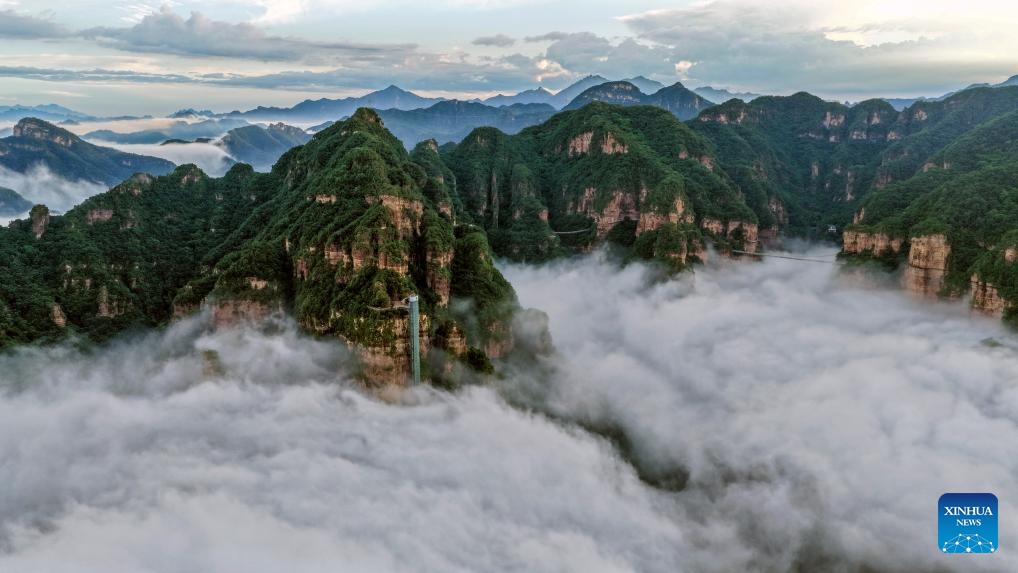 An aerial drone photo taken on June 9, 2026 shows the scenery of a sea of clouds at Xinglong Mountain scenic spot in Chengde City, north China's Hebei Province. (Photo: Xinhua)