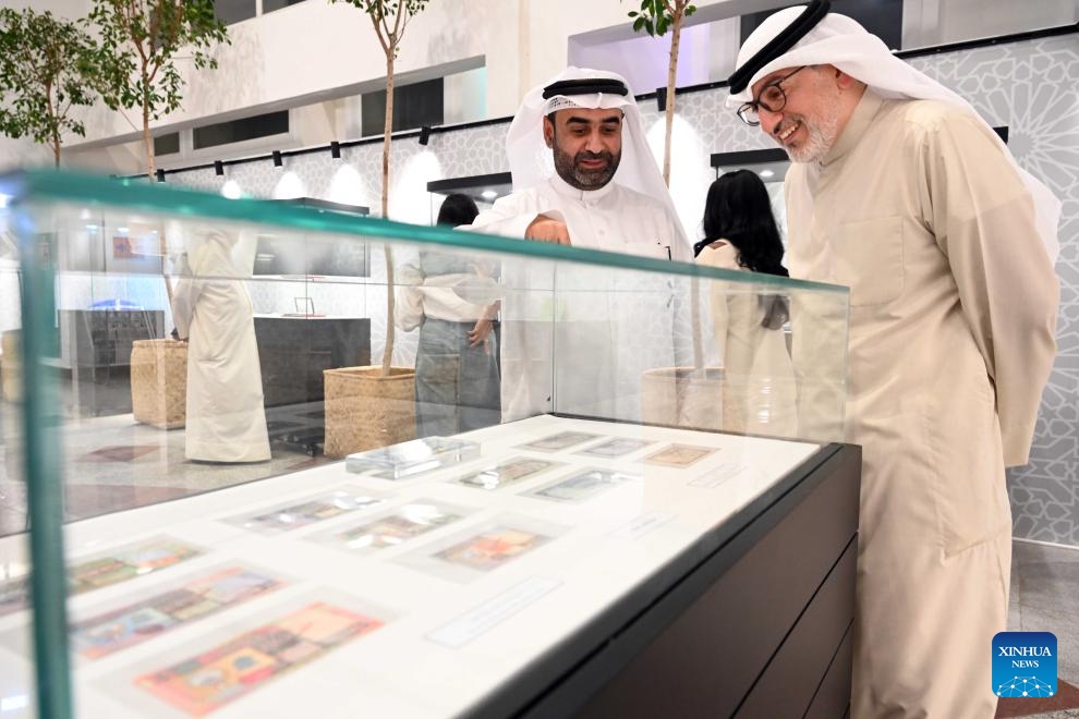 People visit the third International Paper and Metal Coin Exhibition at the Kuwait National Museum in Kuwait City, Kuwait, June 8, 2026. (Photo: Xinhua)