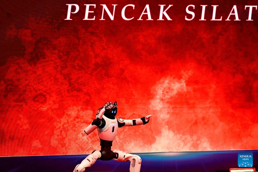 A humanoid robot performs during a partner conference held by Chinese company AGIBOT in Jakarta, Indonesia, June 9, 2026. Chinese embodied AI company AGIBOT on Tuesday held its first partner conference in Indonesia, officially launching its market expansion in the country and showcasing a range of humanoid robots and localized solutions, drawing attention from government officials and industry representatives. (Photo: Xinhua)