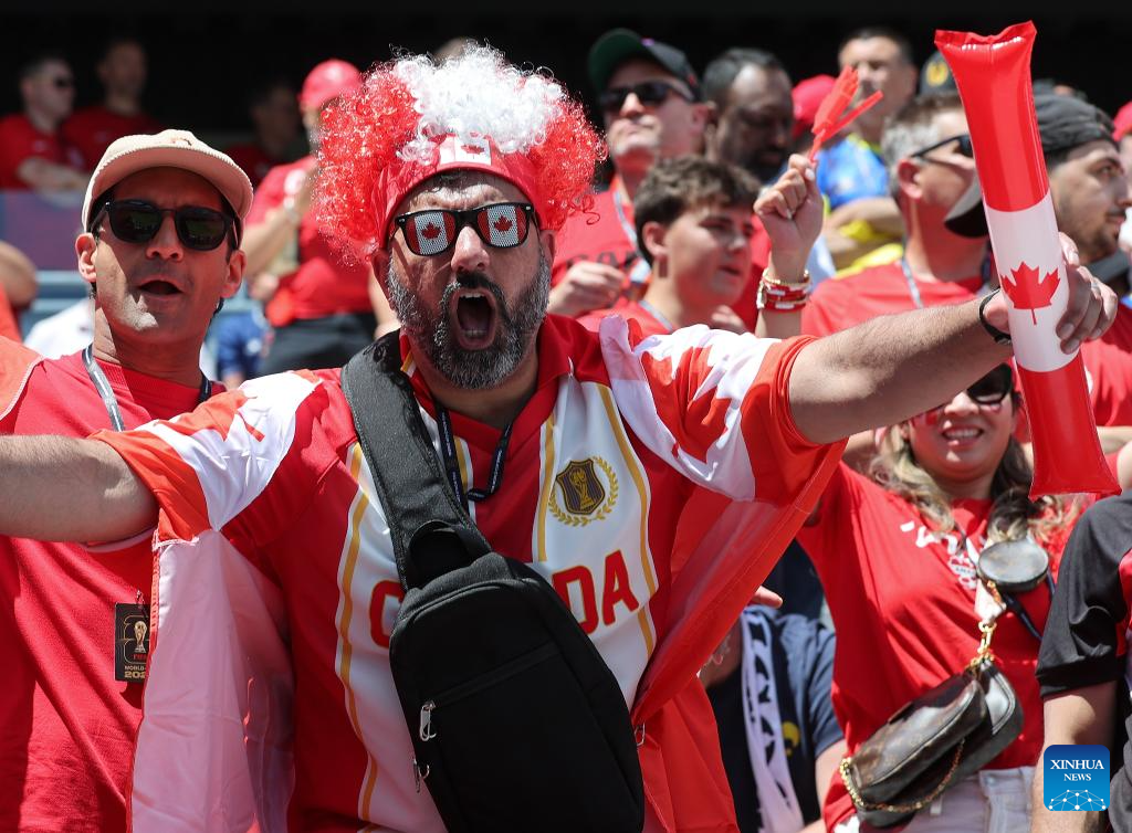 Fans of Canada cheer before the group B match between Canada and Bosnia and Herzegovina at the 2026 FIFA World Cup at Toronto Stadium in Toronto, Canada, June 12, 2026. (Photo by Zou Zheng/Xinhua)