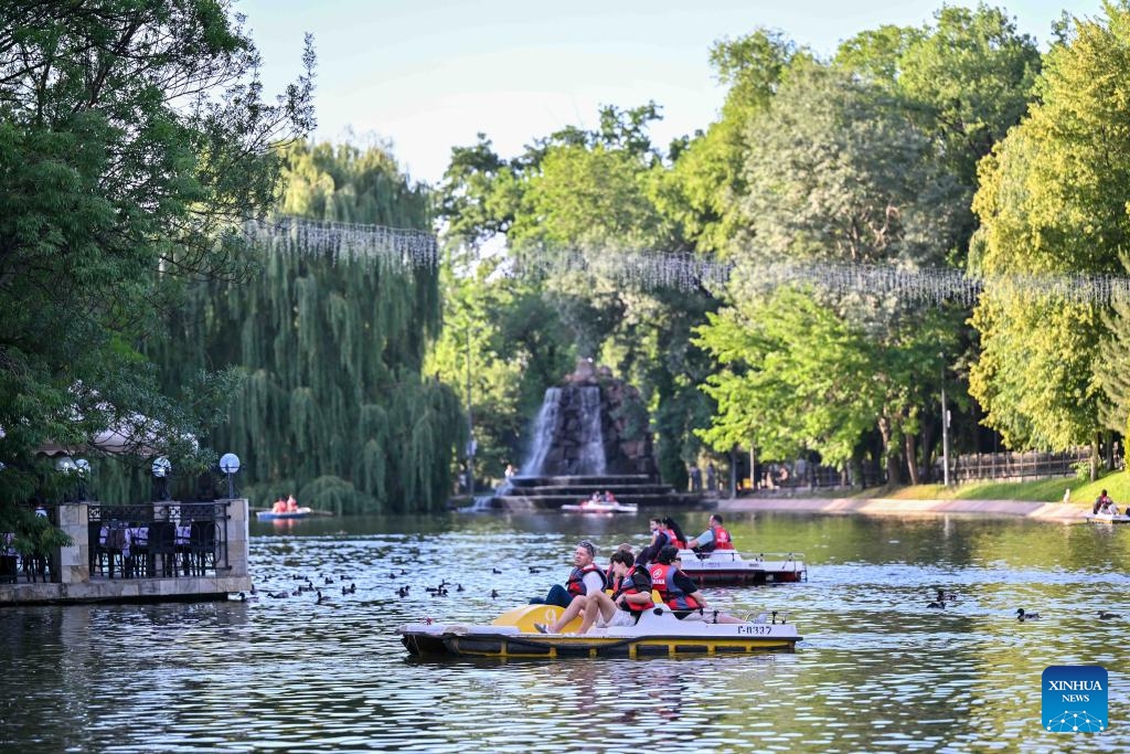 People enjoy themselves at Central Park in Almaty, Kazakhstan, on June 8, 2026. (Photo: Xinhua)
