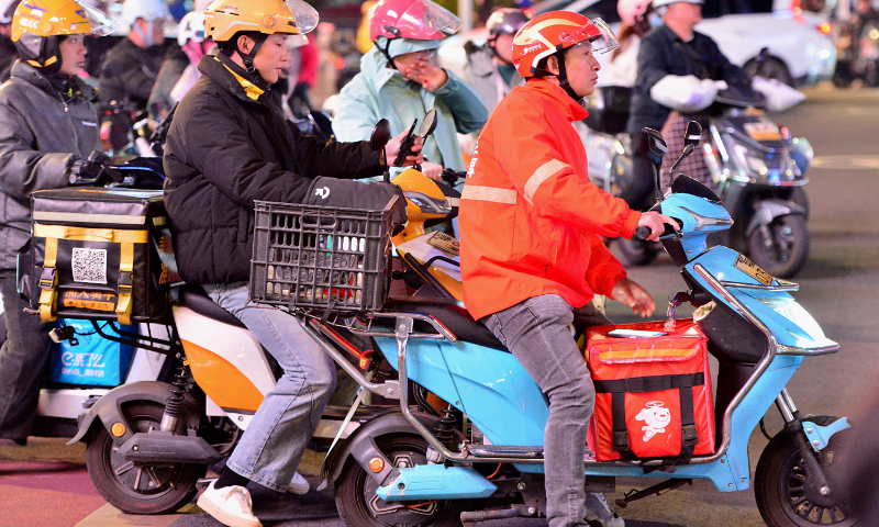 Food deliverymen from different platforms are seen in Fuzhou, East China's Fujian Province, on January 9, 2026. Photo: VCG
