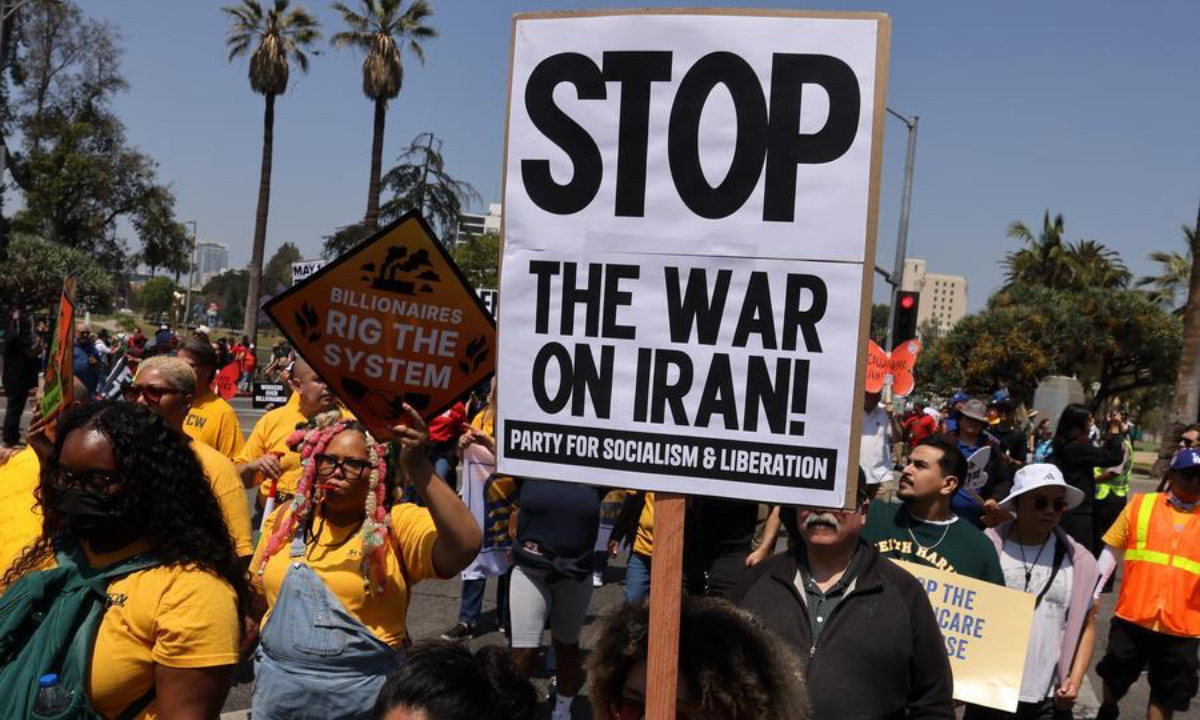 Demonstrators holding placards take part in a May Day rally in Los Angeles, California, the United States, on May 1, 2026. (Photo by Qiu Chen/Xinhua)