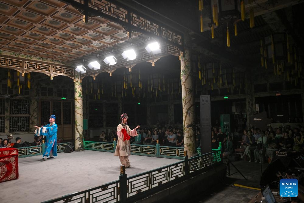 Actors from Shanghai Kunqu Opera Troupe perform at the Grand Theatre of Prince Kung's Palace Museum in Beijing, capital of China, June 9, 2026. The 19th Echoes of Classics: Prince Kung's Palace Museum Intangible Cultural Heritage Performance Season kicked off at the museum's Grand Theatre on Tuesday. Featuring three Kunqu Opera performances and three guqin concerts, the event, which runs until June 14, stages the charm of intangible cultural heritage in ancient architectural sites. (Photo: Xinhua)