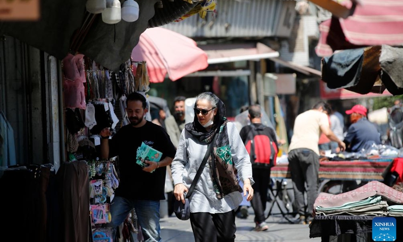 People walk on a street in Tehran, Iran, June 8, 2026. (Photo: Xinhua)