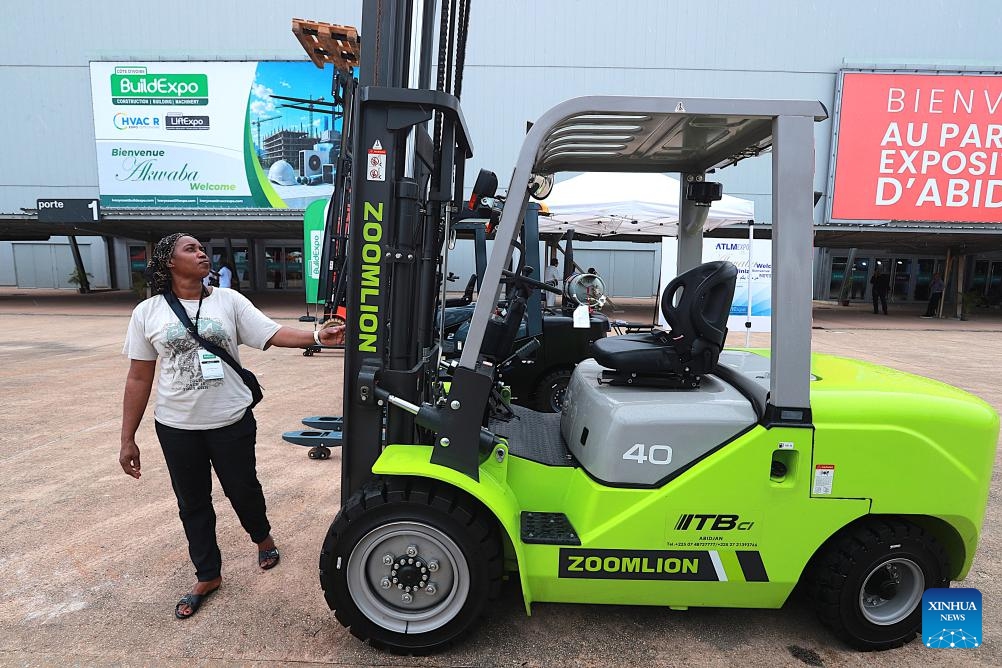 A woman visits the 2nd International Construction, Building Materials, Machinery & Technologies Exhibition (Build Expo Cote d'Ivoire 2026) at the Abidjan Exhibition Center in Abidjan, Cote d'Ivoire, June 9, 2026. (Photo: Xinhua)
