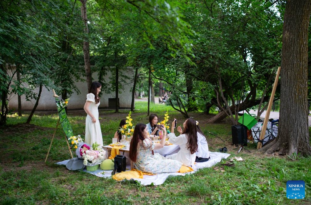 People enjoy themselves at Central Park in Almaty, Kazakhstan, on June 7, 2026. (Photo: Xinhua)