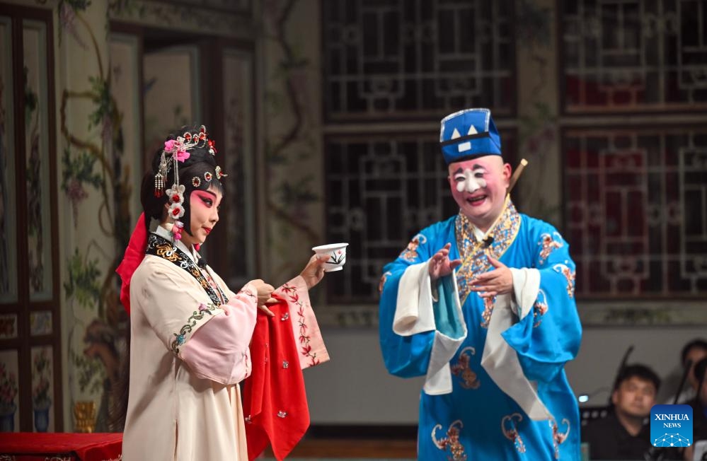 Actors from Shanghai Kunqu Opera Troupe perform at the Grand Theatre of Prince Kung's Palace Museum in Beijing, capital of China, June 9, 2026. The 19th Echoes of Classics: Prince Kung's Palace Museum Intangible Cultural Heritage Performance Season kicked off at the museum's Grand Theatre on Tuesday. Featuring three Kunqu Opera performances and three guqin concerts, the event, which runs until June 14, stages the charm of intangible cultural heritage in ancient architectural sites. (Photo: Xinhua)