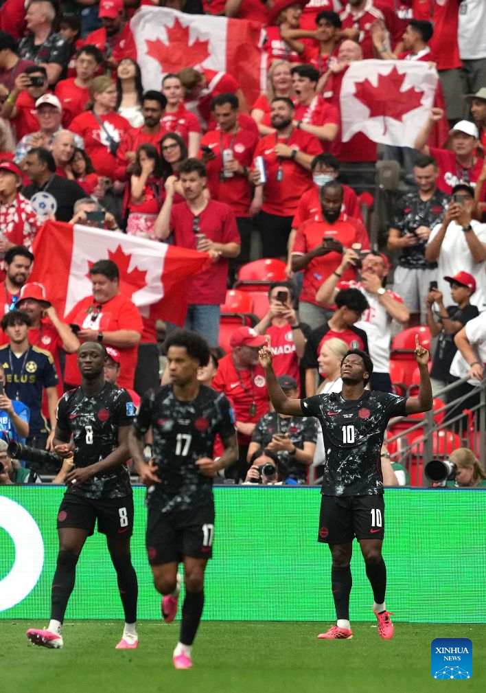 Jonathan David (R) of Canada celebrates his goal during the group B match between Canada and Qatar at the 2026 FIFA World Cup at BC Place Vancouver in Vancouver, Canada, June 18, 2026. (Xinhua/Meng Yongmin)