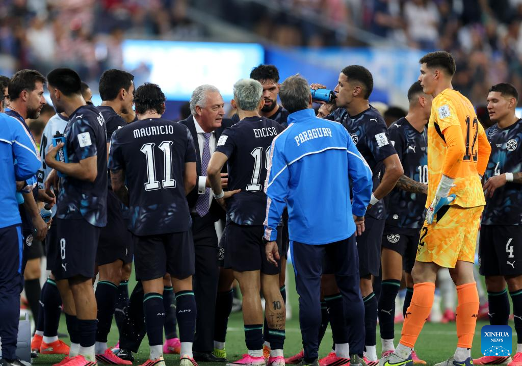 Gustavo Alfaro (C), head coach of Paraguay, instructs during the group D match between the United States and Paraguay at the 2026 FIFA World Cup at Los Angeles Stadium in Los Angeles, the United States, June 12, 2026. (Xinhua/Mao Siqian)
