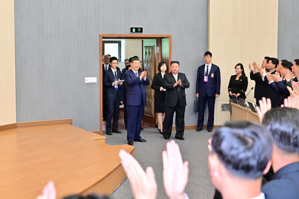 Xi Jinping, general secretary of the Communist Party of China Central Committee and Chinese president, walks into a lecture hall of the Central Cadres Training School of the Workers' Party of Korea (WPK) in the company of Kim Jong Un, general secretary of the WPK and president of the State Affairs of the Democratic People's Republic of Korea (DPRK), in Pyongyang, the DPRK, June 9, 2026. On Tuesday morning, Xi, accompanied by Kim, visited the Central Cadres Training School of the WPK in Pyongyang. (Photo: Xinhua)