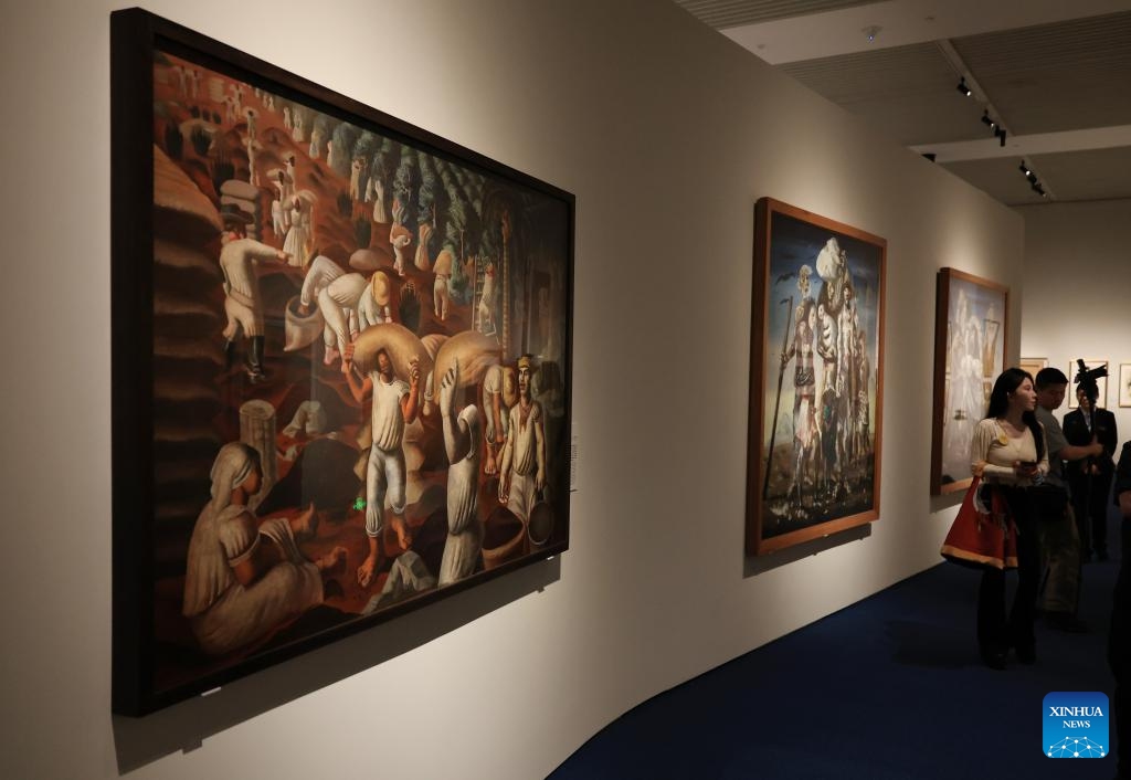 People visit an art exhibition titled The Brazil of Portinari at the National Museum of China in Beijing, capital of China, June 9, 2026. The exhibition showcased 56 paintings of the renowned Brazilian artist Candido Portinari. (Photo: Xinhua)