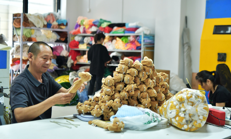 Workers perform quality inspection on products ready for shipment at a plush toy company in the Baigou new area of Baoding, North China's Hebei Province, on June 9, 2026. Baigou is home to more than 3,600 toy business entities. In 2025, local companies completed the design of more than 30,000 original plush toy products, and generated an annual output value of 20 billion yuan ($2.95 billion). Photo: VCG