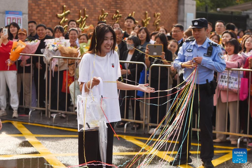 A student is greeted with colored ribbons after the national college entrance exam in Changchun, northeast China's Jilin Province, June 9, 2026. China's national college entrance exam, also known as the gaokao, began on June 7 this year. The exam in some regions has ended on Tuesday. (Photo: Xinhua)