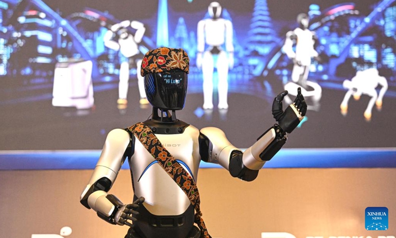 A humanoid robot performs during a partner conference held by Chinese company AGIBOT in Jakarta, Indonesia, June 9, 2026. Chinese embodied AI company AGIBOT on Tuesday held its first partner conference in Indonesia, officially launching its market expansion in the country and showcasing a range of humanoid robots and localized solutions, drawing attention from government officials and industry representatives. (Photo: Xinhua)