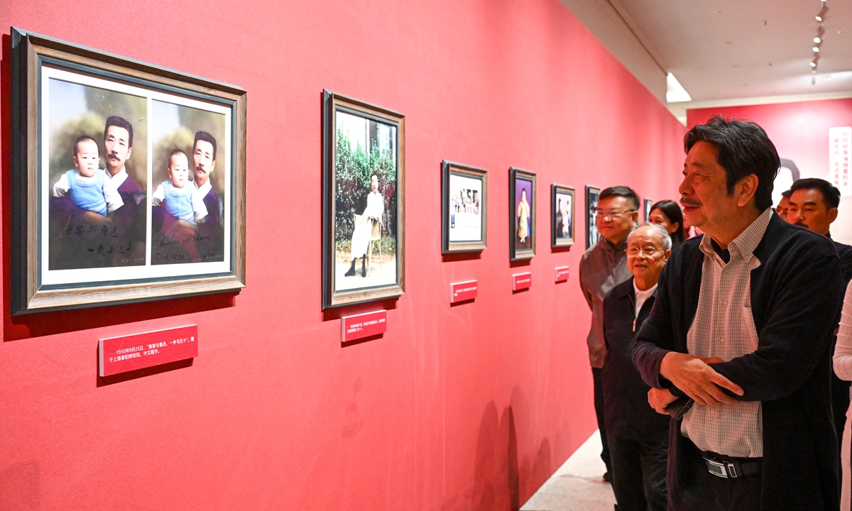 Zhou Lingfei, the eldest grandson of famous 20th-century Chinese writer Lu Xun, views restored photos of Lu Xun on June 10, 2026 at an exhibition in Kunming, Yunnan Province. The exhibition of restored original photos of Lu Xun, whose real name was Zhou Shuren (1881-1936), retraces the trajectory of the writer's life. Photo: VCG