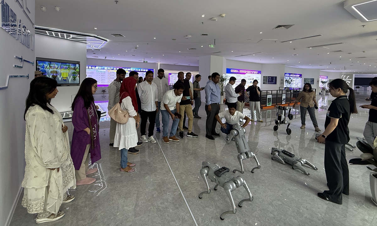 A delegation of youth, women, and student representatives from the Bangladesh Nationalist Party (BNP) visits Chongqing Robot AI Application Exhibition Center on June 6, 2026. Photo: Courtesy of the delegation 
