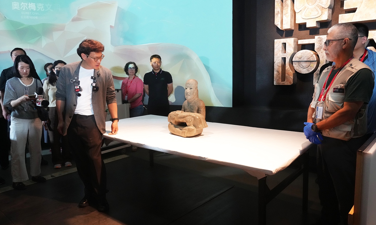 An artifact from the upcoming exhibition On Top of the World Tree: Ancient Civilizations of the Americas is seen during a special unboxing event at the Shanghai Museum on June 11, 2026. Four key exhibits are unveiled that day. Photo: VCG