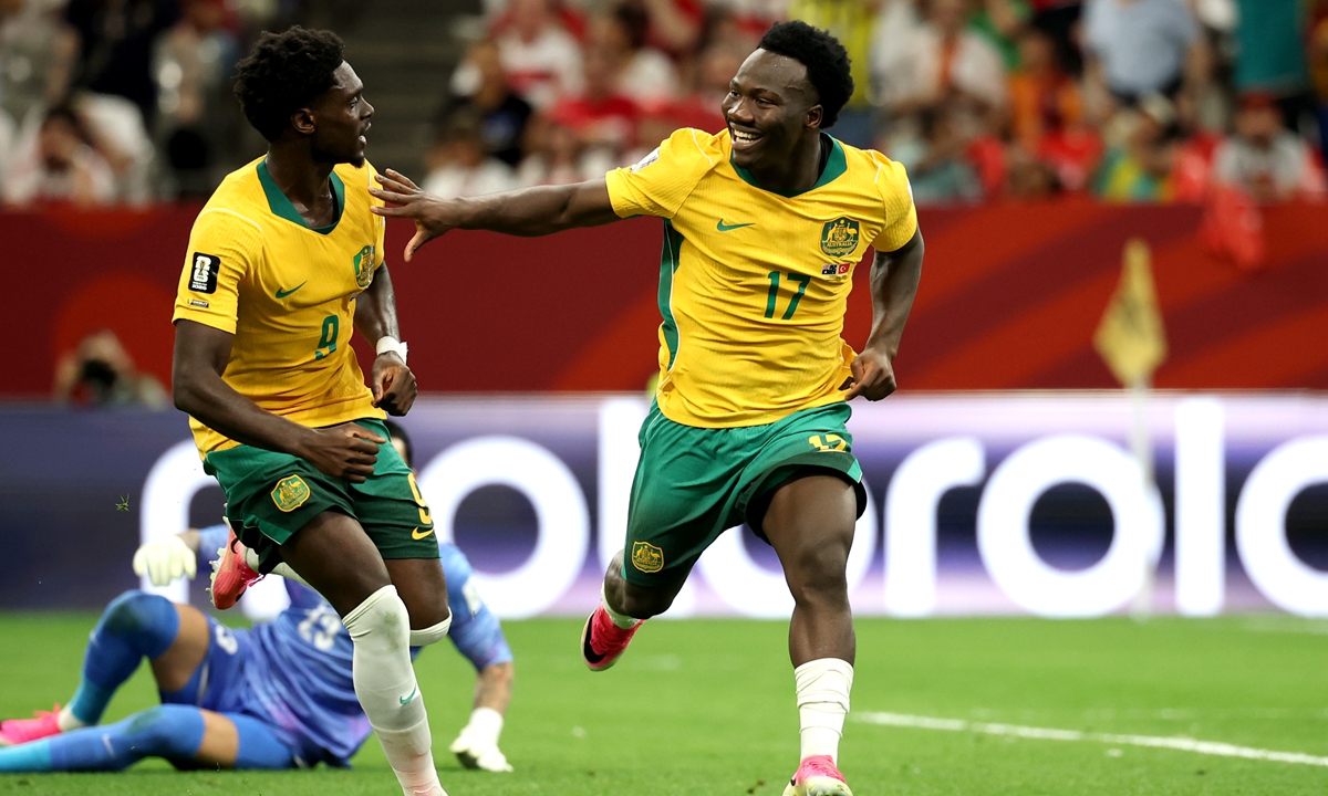 Nestory Irankunda of Australia (right) celebrates scoring a goal with teammate Mohamed Toure during the FIFA World Cup Group D match between Australia and Turkey at BC Place Vancouver on June 13, 2026 in Vancouver, British Columbia. Australia ultimately defeated Turkey 2-0. Photo: VCG