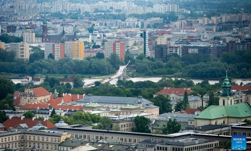 This photo taken on June 9, 2026 shows the Vistula River and a pedestrian bridge seen from the observation deck of the Palace of Culture and Science in Warsaw, Poland. (Photo: Xinhua)