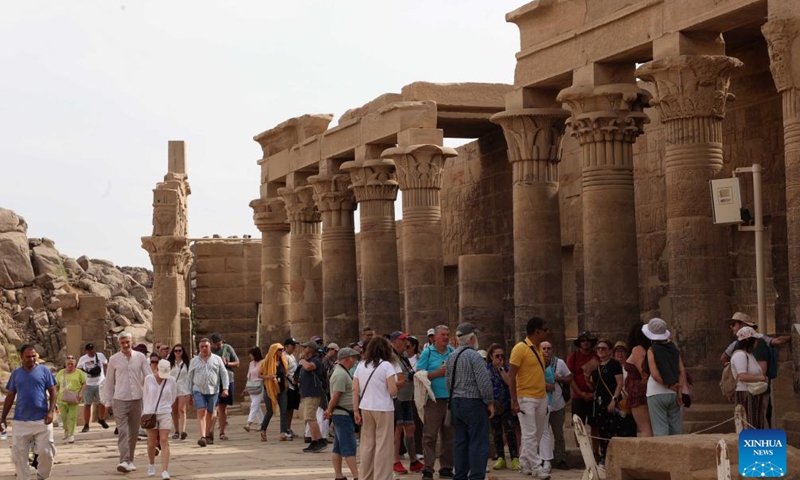 Tourists visit the Philae Temple complex in Aswan, Egypt, June 10, 2026. Egypt's tourism revenues rose 14.9 percent year-on-year to 14.4 billion U.S. dollars during the first nine months of the 2025/26 fiscal year, according to a government statement issued on Wednesday. (Photo: Xinhua)