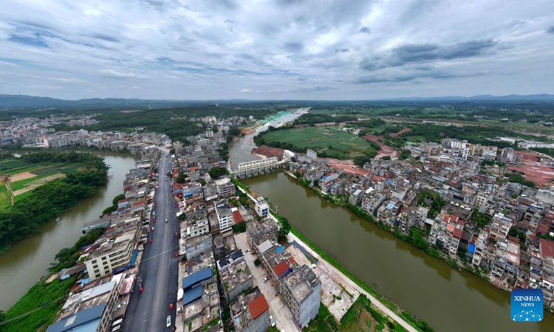 An aerial drone photo taken on June 10, 2026 shows a view of Luwu Town in Lingshan County, south China's Guangxi Zhuang Autonomous Region. Located on the middle reach of the Qinjiang River, Luwu Town was once an important trading hub. The town is expected to witness new development once the Pinglu Canal is completed. (Photo: Xinhua)