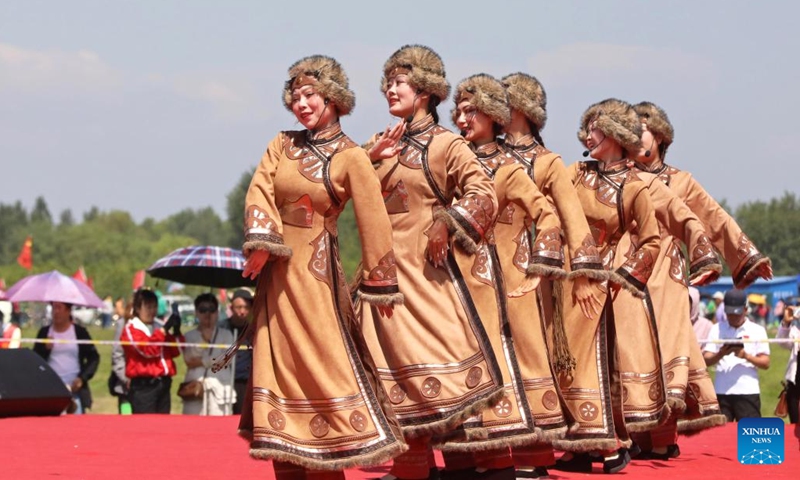 Artists perform during the Kumule Festival at a grassland in Qiqihar, northeast China's Heilongjiang Province, June 10, 2026. The 39th Kumule Festival, a traditional festival of Daur ethnic group, opened here on Wednesday. The three-day festival will offer people with grassland concerts, bonfire gatherings and other various events to show the culture and customs of Daur people. (Photo: Xinhua)