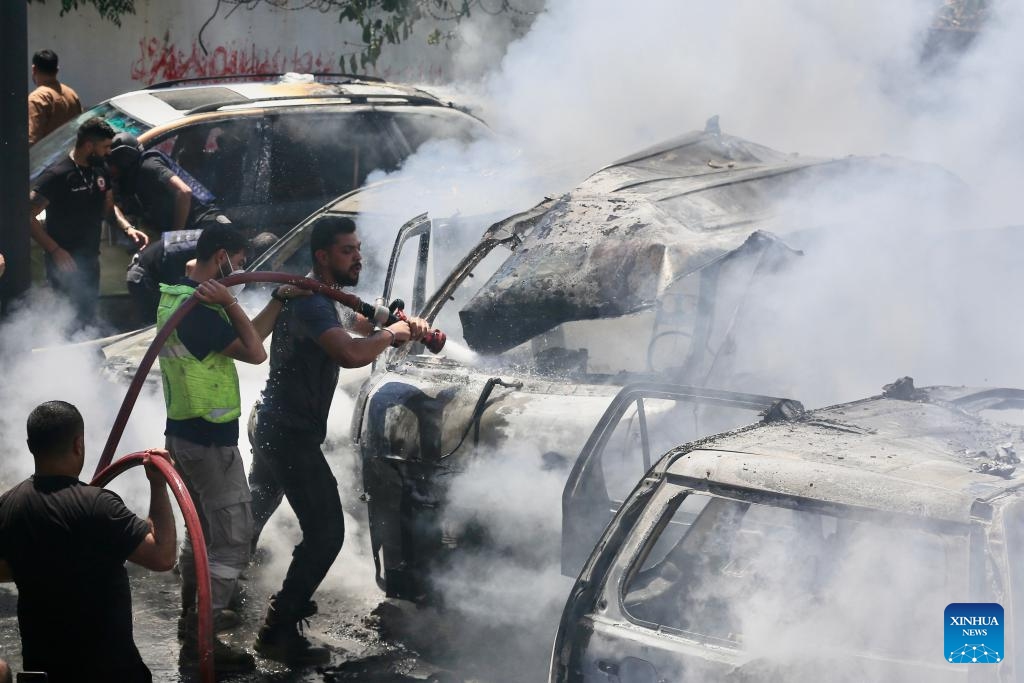 Photo taken on June 10, 2026 shows people putting out fire after an Israeli airstrike in Sidon, south Lebanon. Israeli attacks on southern Lebanon killed at least 18 people and injured several others on Wednesday, according to Lebanon's National News Agency, civil defense and health authorities. (Photo: Xinhua)