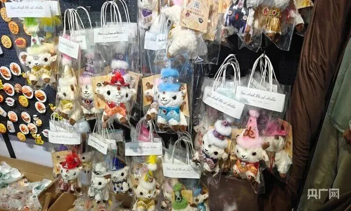 Xinjiang's custom ethnic sheep dolls decorated with local ornaments Photo: Screenshot from cnr.cn