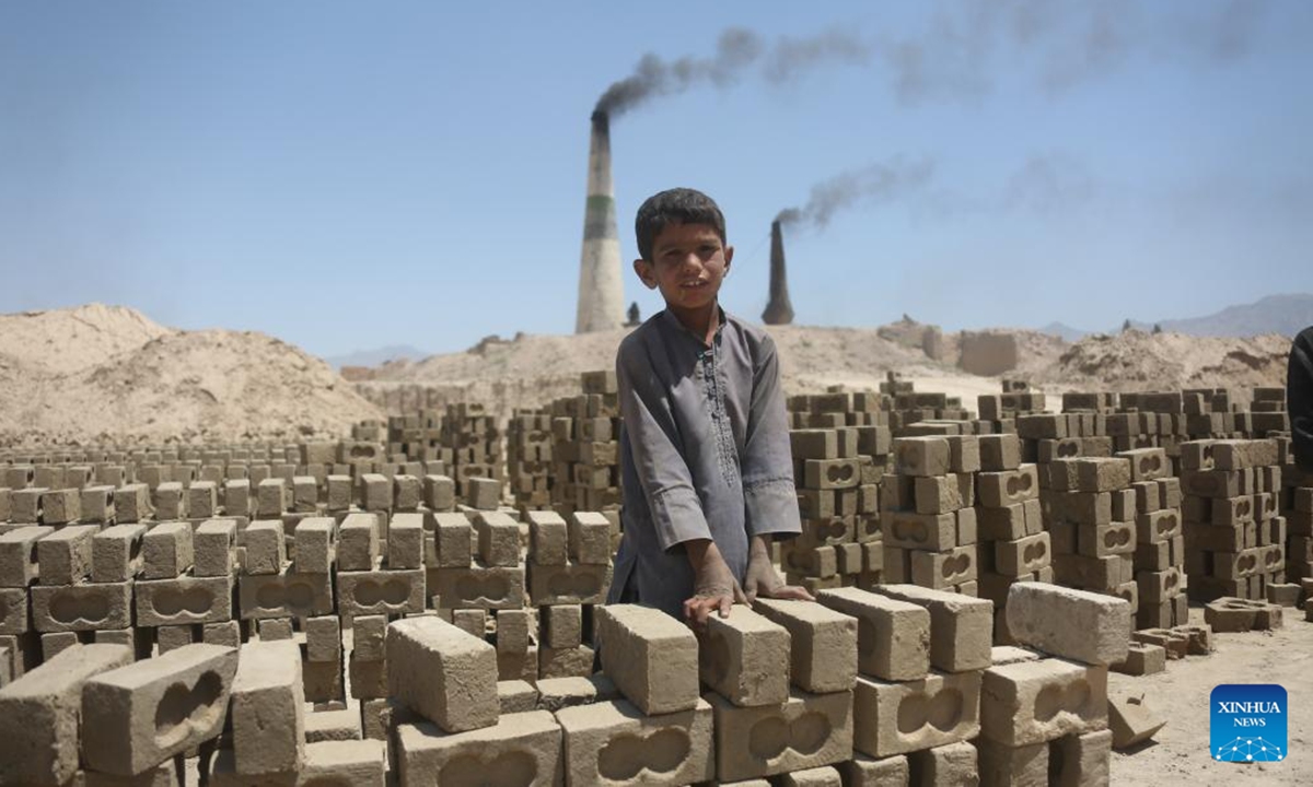 An Afghan child works at a brick factory in Kabul, Afghanistan, June 9, 2026. As the international community observes the World Day Against Child Labor on June 12, millions of Afghan children are leaving school to work in brick kilns, markets, construction sites, and workshops, driven by grinding poverty that has upended families across the poverty-stricken country. (Photo by Saifurahman Safi/Xinhua)