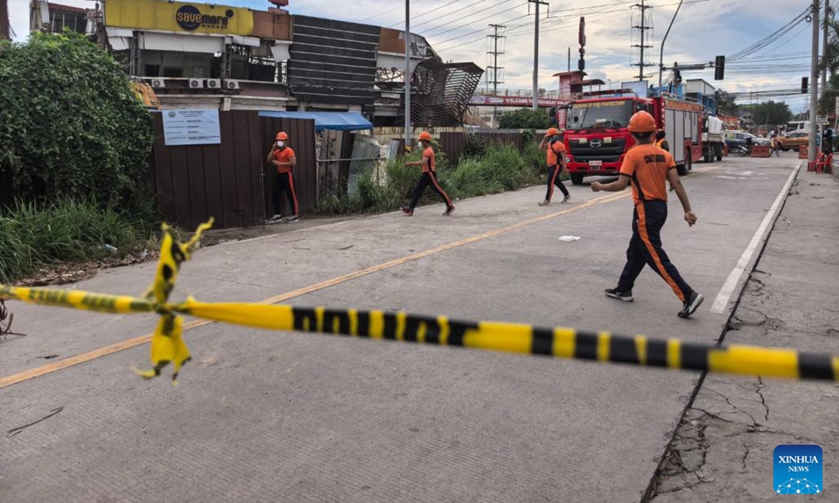 Rescuers are pictured in action after an earthquake in General Santos City, the Philippines, on June 10, 2026. At least 47 people were killed, 31 missing and 688 injured after a magnitude 7.8 earthquake struck off the southern coast of Mindanao, the Philippines, on Monday, said the National Disaster Risk Reduction and Management Council (NDRRMC) on Thursday. (Str/Xinhua)