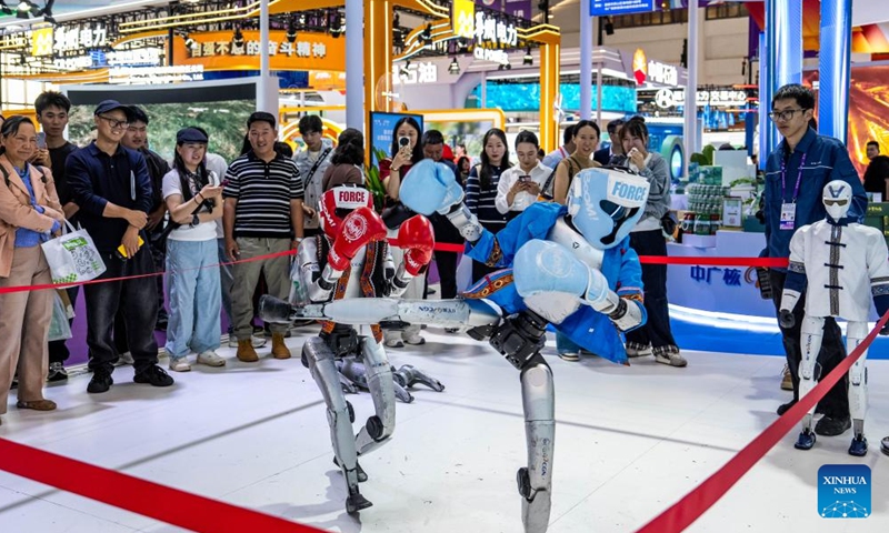 People watch a robot fight performance at the 10th China-South Asia Expo in Kunming, southwest China's Yunnan Province, June 12, 2026. The 10th China-South Asia Expo kicked off on Thursday in Kunming City, capital of southwest China's Yunnan Province. The event has put an emphasis on enhancing regional trade and industrial cooperation under the theme Solidarity and Coordination for Common Development. (Xinhua/Hu Chao)