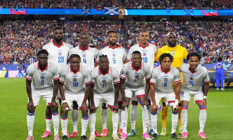 Players of Haiti line up before the group C match between Haiti and Scotland at the 2026 FIFA World Cup at Boston Stadium in Boston, the United States, June 13, 2026. (Xinhua/Chen Yichen)