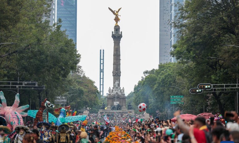People take part in a World Cup parade in Mexico City, capital of Mexico, June 13, 2026. (Xinhua/Alejandro Medina)