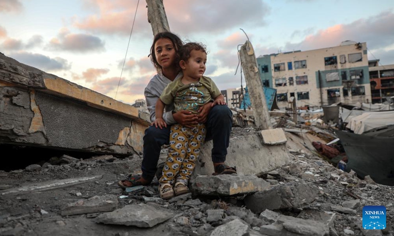 Displaced Palestinian children are seen at a temporary shelter in Gaza City, on June 12, 2026. (Photo by Rizek Abdeljawad/Xinhua)