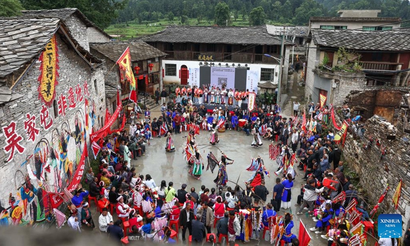 Villagers stage a Dixi opera performance in Wujiatun of Zhangzhuang Village, Anshun City, southwest China's Guizhou Province, June 13, 2026. (Xinhua/Yang Wenbin)