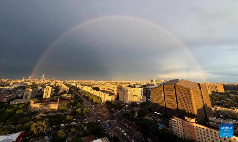 This photo taken on June 13, 2026 shows a rainbow in the sky over Beijing, capital of China. (Photo by Wang Junfeng/Xinhua)