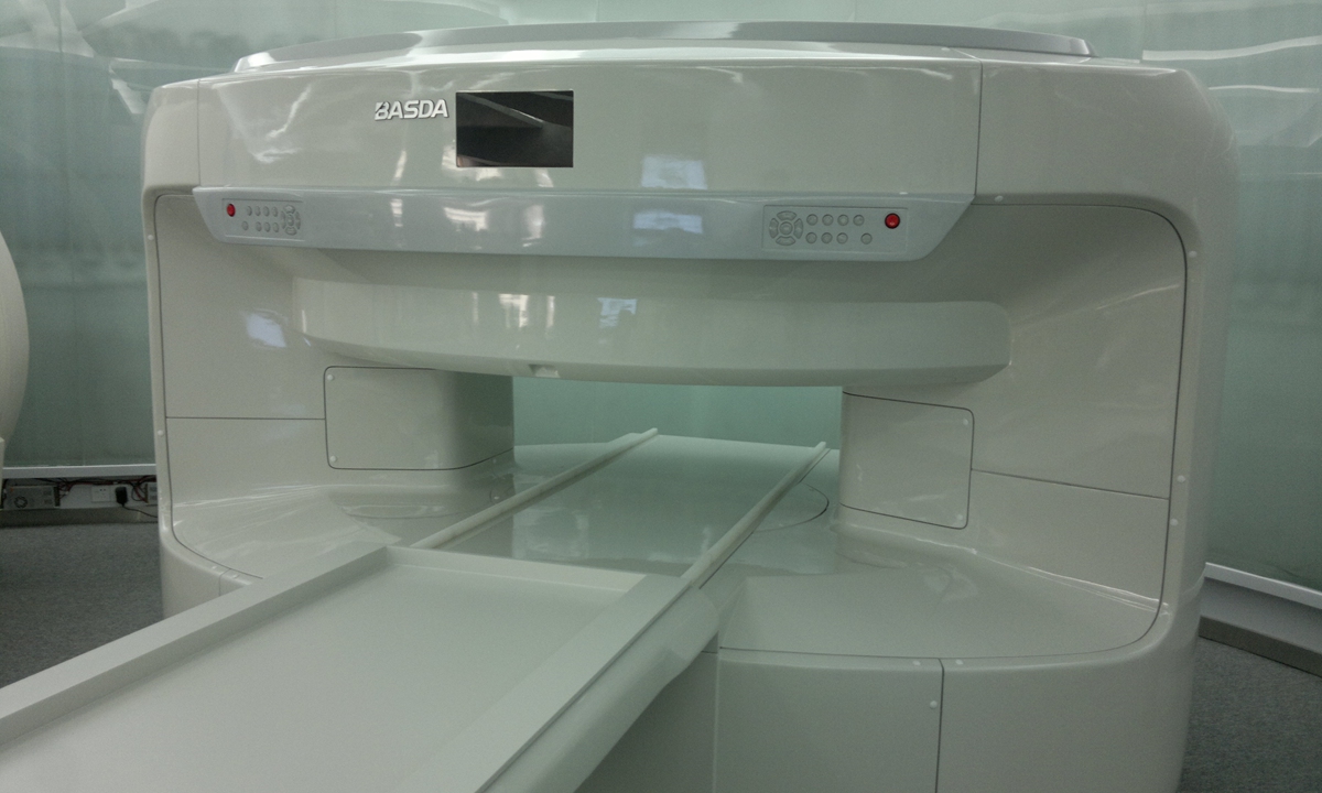 The 0.7 T open superconducting MRI system