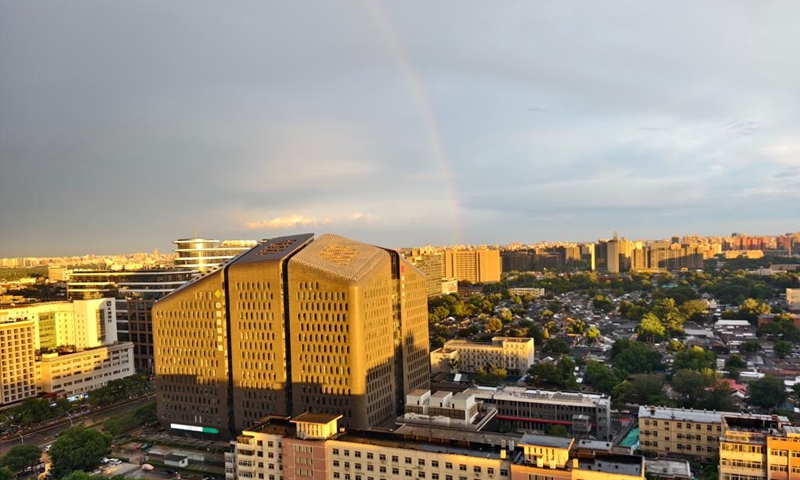 This photo taken on June 13, 2026 shows a rainbow in the sky over Beijing, capital of China. (Photo by Wang Junfeng/Xinhua)